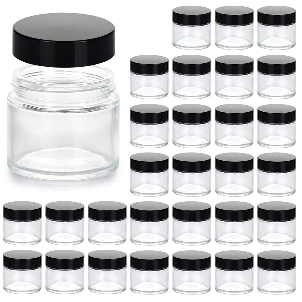 Hoa Kinh 2oz jar with lid, clear glass, ideal for travel-size cosmetics.