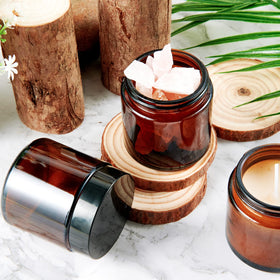 Hoa Kinh 4oz amber glass jar side view highlighting compact travel-friendly design