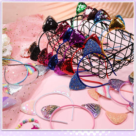 Hoemwarm fabric-covered headband with glitter details adds lightweight comfort.