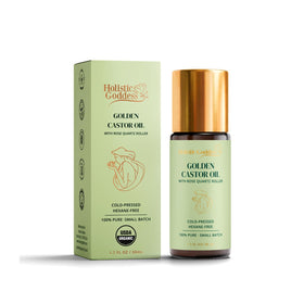 Holistic Goddess Golden Castor Oil Roller on lashes for conditioning and gentle daily beauty.