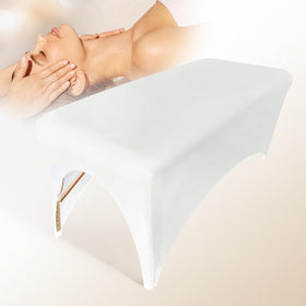 Holits spa bed cover on a massage table, for a professional lash extension setup.