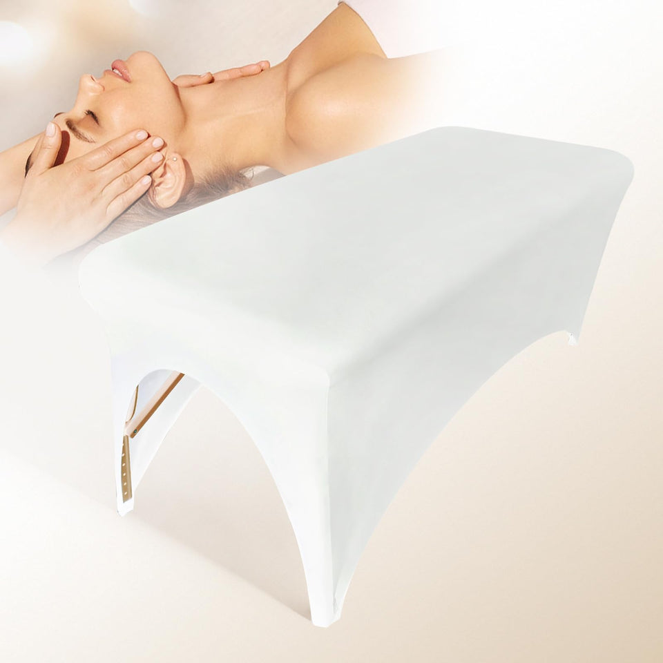 Holits spa bed cover on a massage table, for a professional lash extension setup.