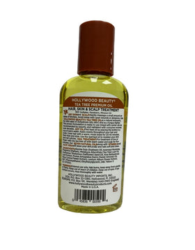 Hollywood Beauty Tea Tree Oil drops on scalp provide refreshing moisture.