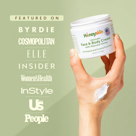 Honeyskin cream being gently applied to the face for soothing relief