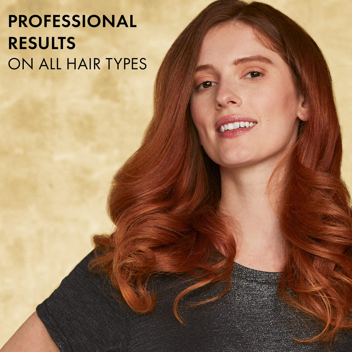 Hot Tools 24K Gold digital curling iron — digital display shows precise temperature control.