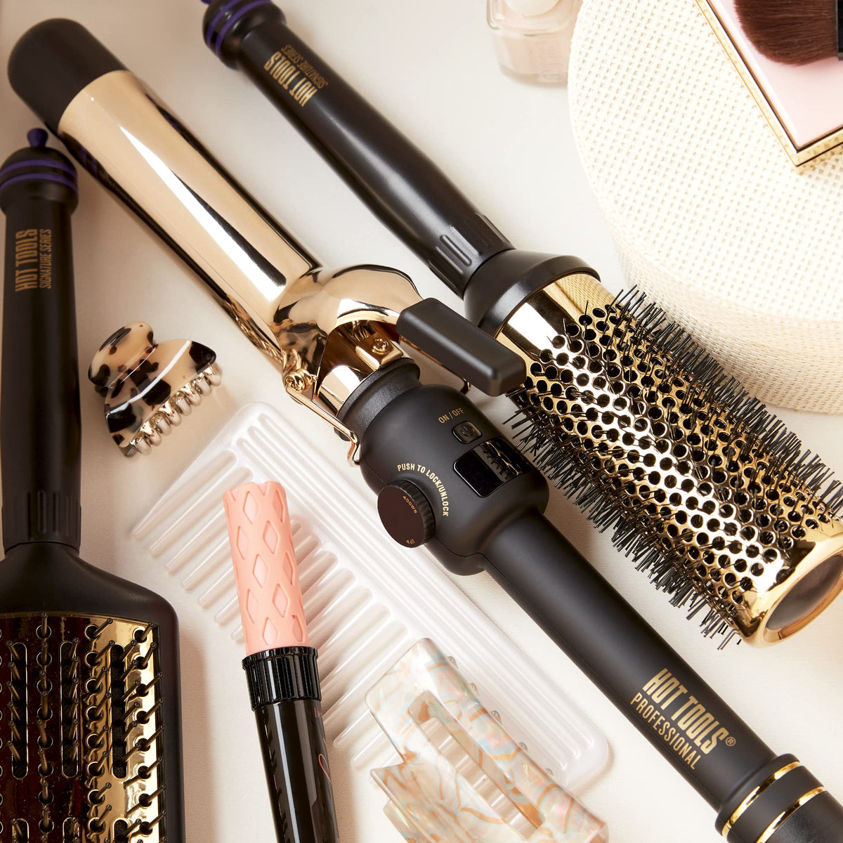 Hot Tools 24K Gold digital curling iron — foldaway safety stand for safe use.