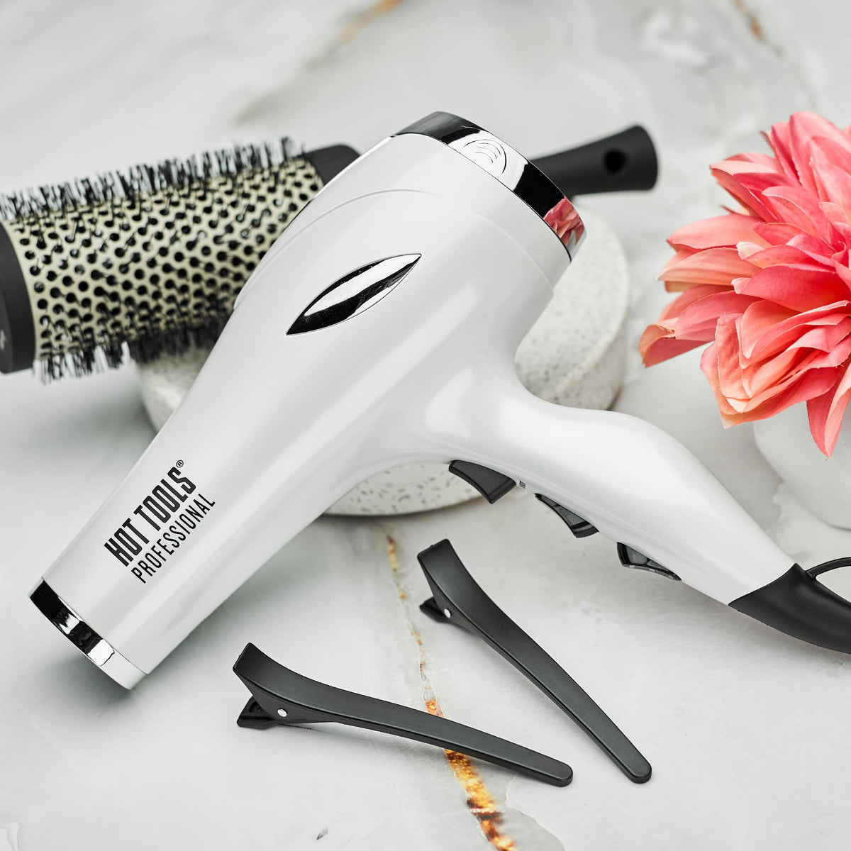 Hot Tools Pro Artist 2400 Turbo cool shot locks in style.
