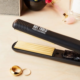 Hot Tools Pro Artist 24K Gold Crimping Iron during styling to add texture