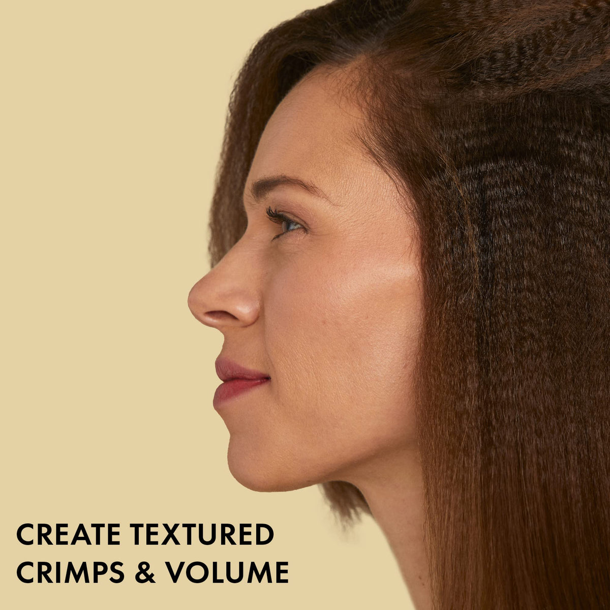 Hot Tools Pro Artist 24K Gold Crimping Iron in action for light textured crimps