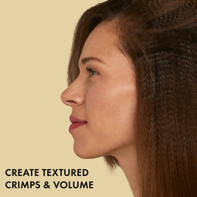 Hot Tools Pro Artist 24K Gold Crimping Iron in action for light textured crimps