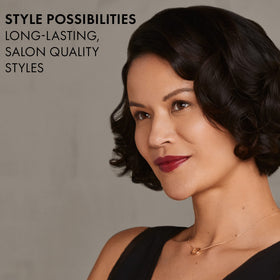 HOT TOOLS Pro Artist Black Gold Curling Iron offers adjustable heat for all hair types.