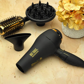 Hot Tools Pro Artist Black Gold lightweight design in hand for comfortable daily blow-drying.