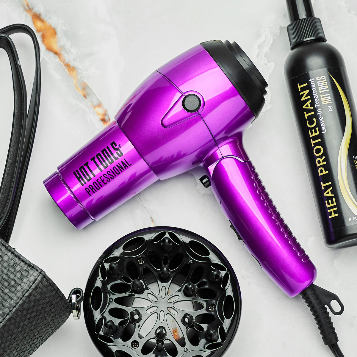 Lightweight Hot Tools dryer with cool shot to set styles.