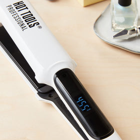 HOT TOOLS Pro Artist Nano Ceramic Straightener with long plates speeds up styling.