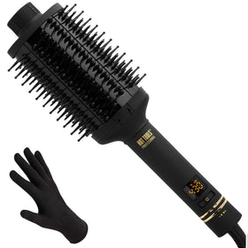 Hot Tools Pro Artist Oval Brush close-up showing the Black Gold surface for even heat