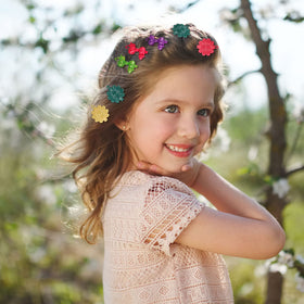 Hoteam photography session hair accessory enhances cute looks.