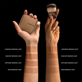 Hourglass Ambient Lighting Bronzer Nude Bronze Light packaging highlights vegan and cruelty-free formula.