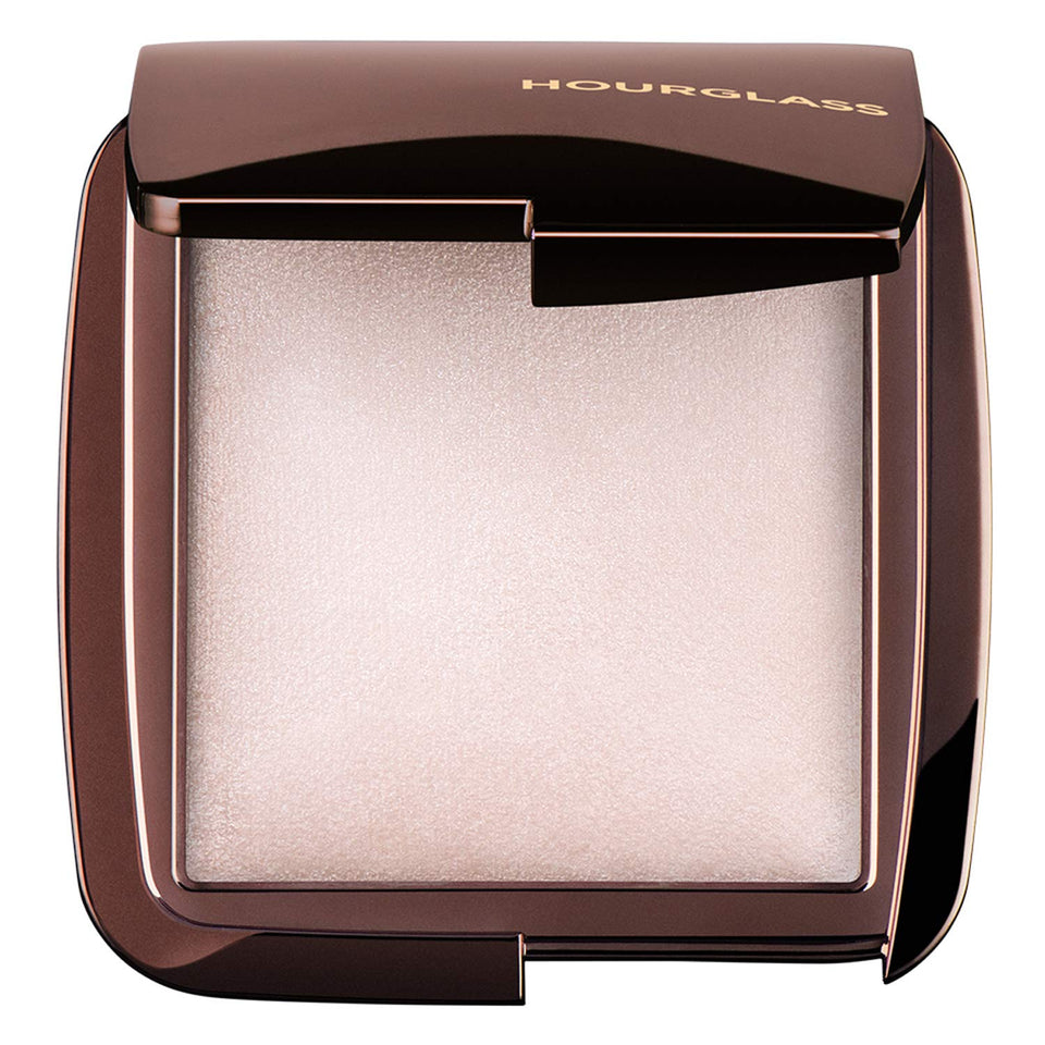 Hourglass Ambient Lighting Finishing Powder Ethereal Light Swirl highlights soft luminosity for flattering skin.