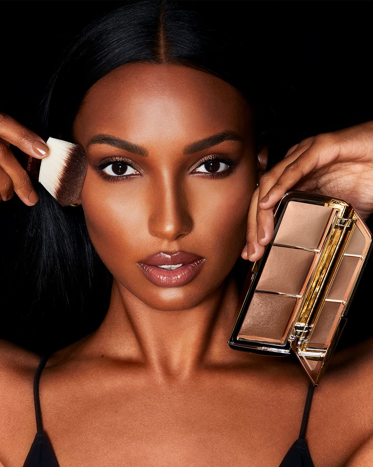 Hourglass Ambient Lighting Palette Vol 2 in use on skin for a glow-enhanced look.