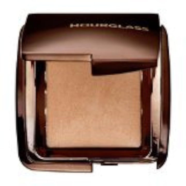 Hourglass Mini Ambient Lighting Powder in Dim Light diffuses glow for balanced radiance