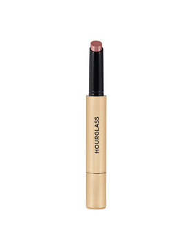 Hourglass Phantom Glossy Balm Sense 110 twist-up pen applying a hydrating gloss.