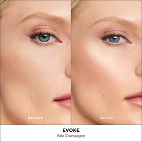 Hourglass Unreal Liquid Highlighter on brow bones adds subtle lift with a luminous finish.