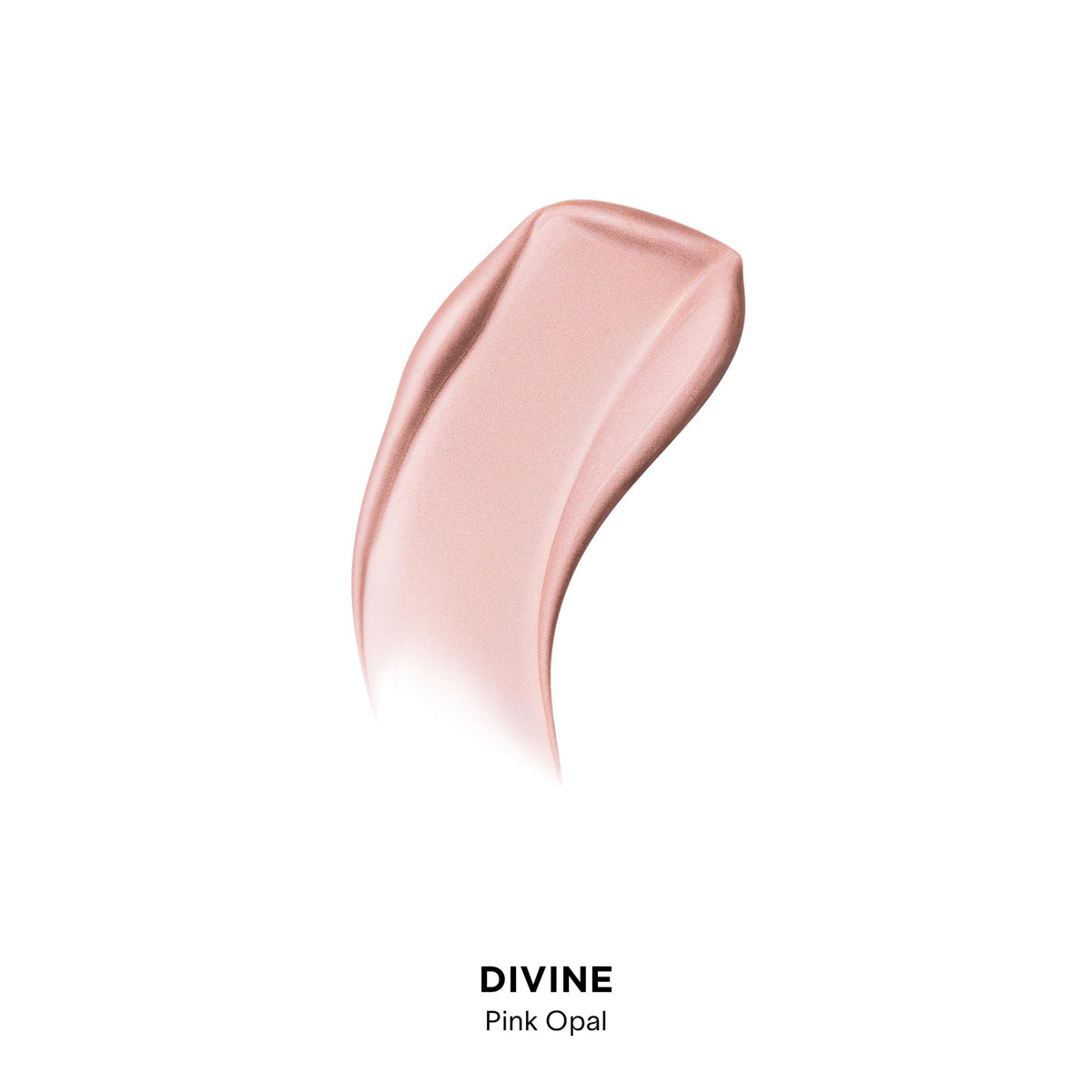 Hourglass Unreal Liquid Highlighter on brow bones for a soft, luminous highlight.
