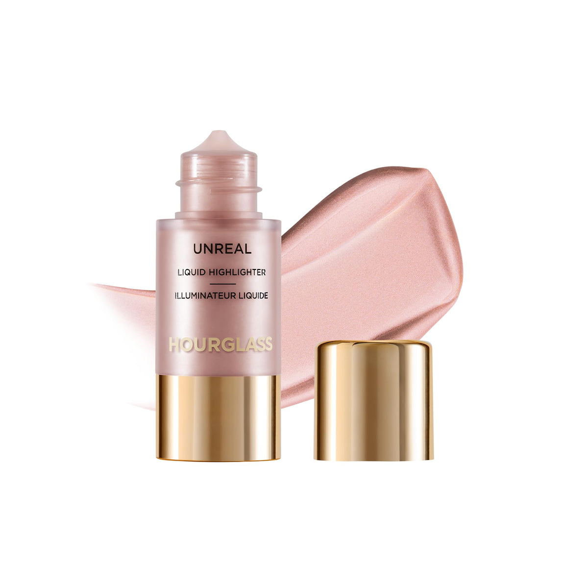 Hourglass Unreal Liquid Highlighter on cheekbones for lifted radiance.