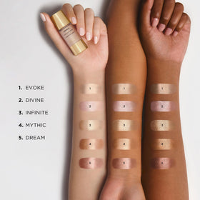 Hourglass Unreal Liquid Highlighter on cupids-bow creates a bright, defined glow.