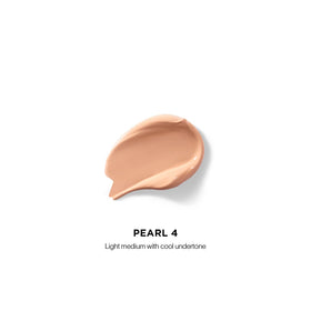 Hourglass Vanish Airbrush Concealer wand ready for precise blemish coverage.