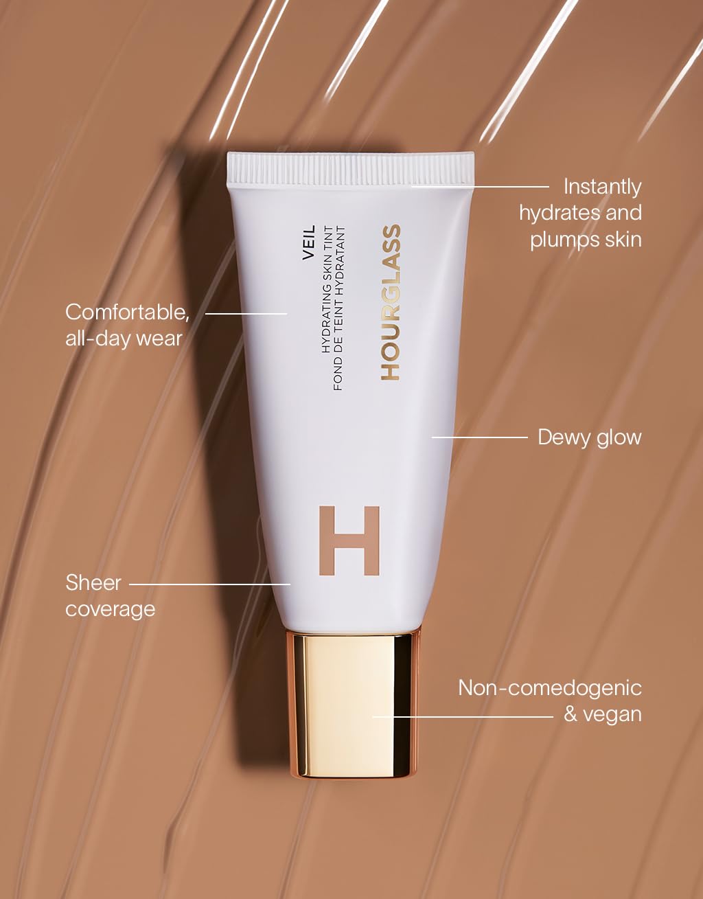 Hourglass Veil Hydrating Skin Tint pairs well with concealer for seamless makeup.