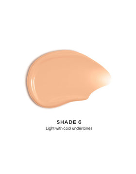 Hourglass Veil Hydrating Skin Tint swatch on skin showing natural, buildable coverage.