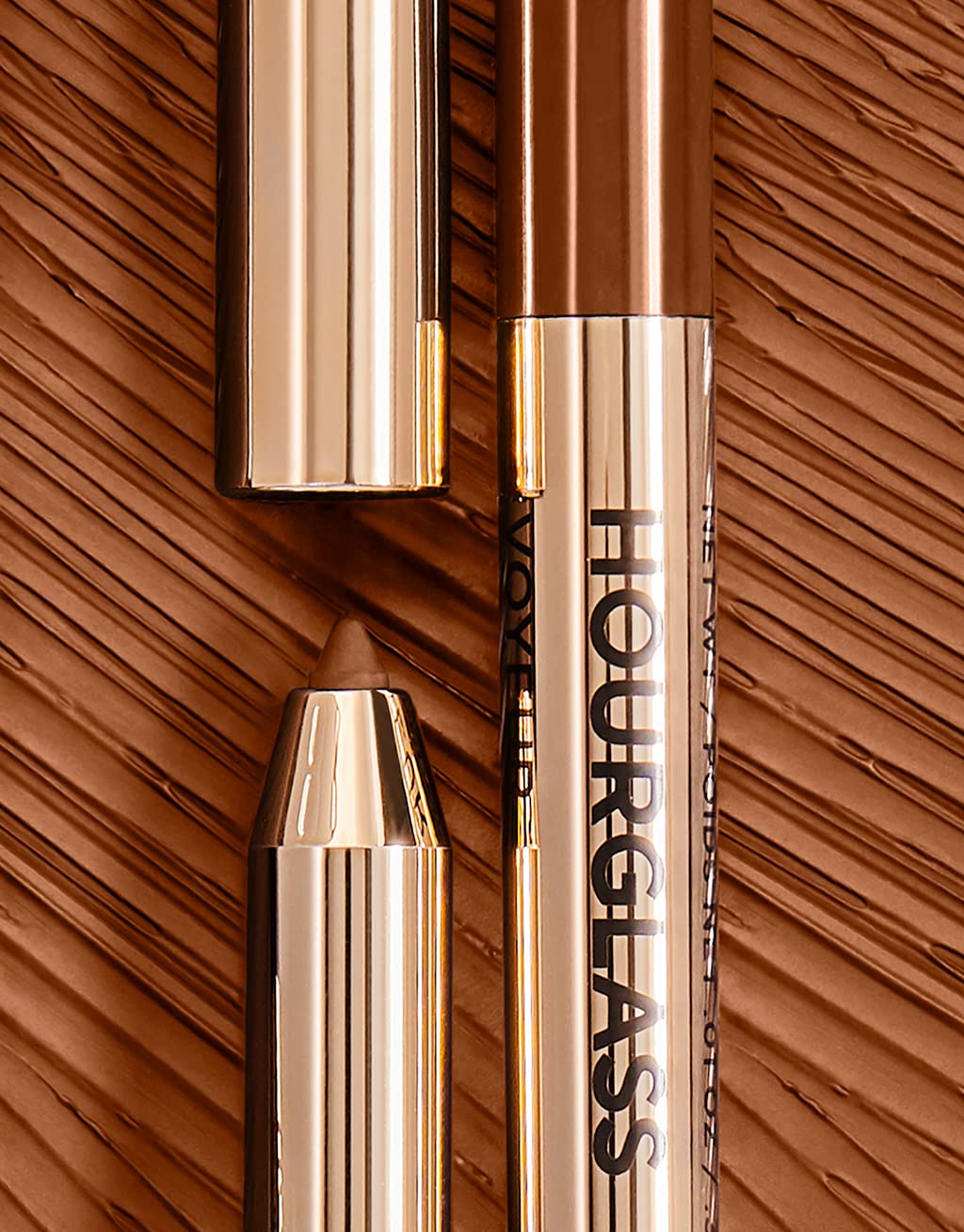 Hourglass Voyeur Solstice tube-front, sleek design for controlled application.