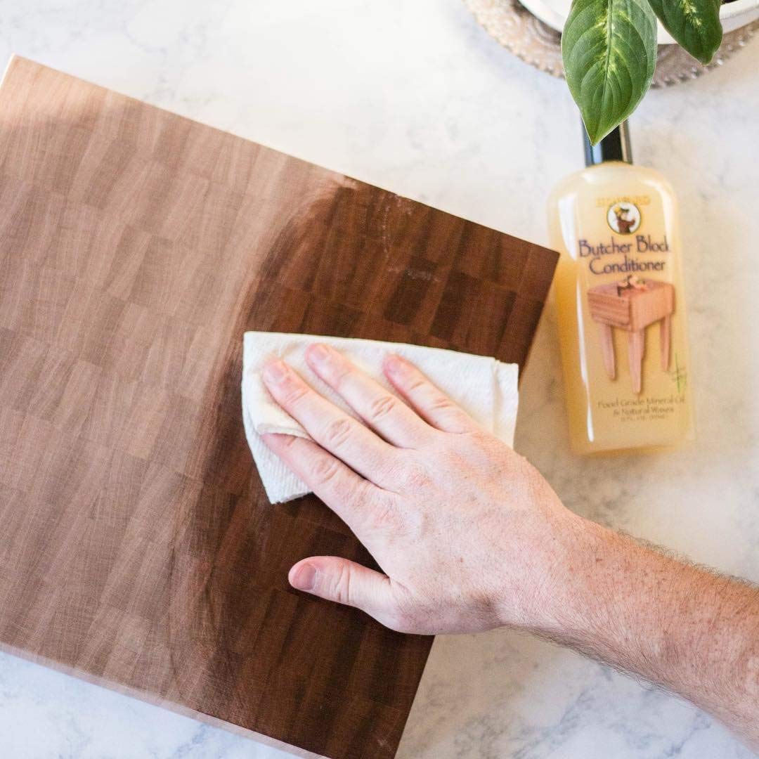Howard BBC012 conditioner applied to a cutting board to nourish wood.