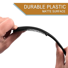 HQSLsund compact six-inch combs shown in hand for portability