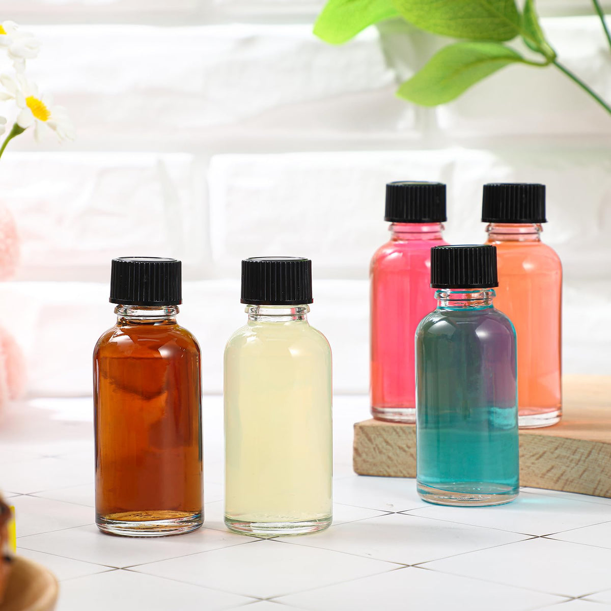 Hsei clear Boston bottle display for product labeling and gifting.