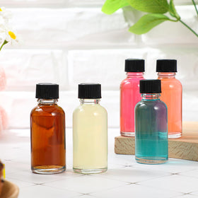 Hsei clear Boston bottle display for product labeling and gifting.