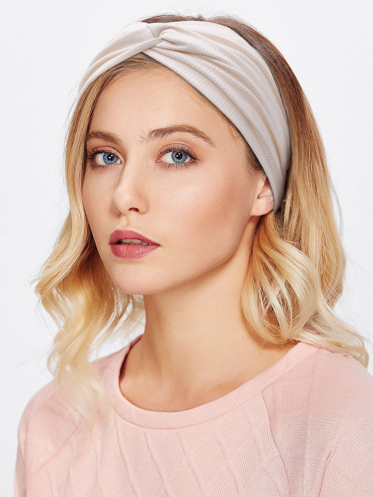 Huachi Boho knotted headband in oxford, complements diverse wardrobes with twist detail.