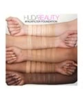 Huda Beauty FauxFilter application close-up reveals airbrushed finish without cakiness.
