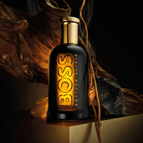 Hugo Boss Bottled Elixir cap detail with icy-gold finish for luxury, refined style.