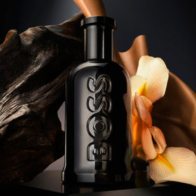 Hugo Boss Bottled Parfum bottle with wood-tone cap showcasing a refined, long-lasting scent.