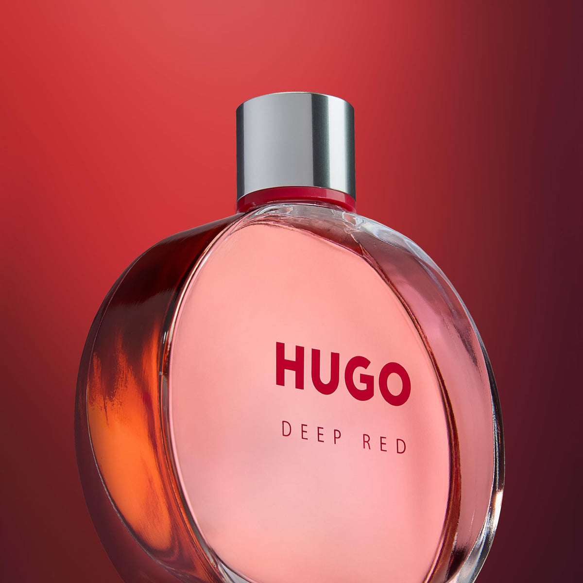 Hugo Boss Deep Red outer packaging with rich red accents suggests premium fragrance experience