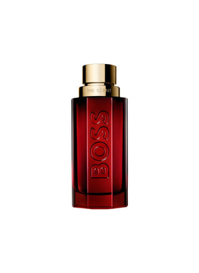 Hugo Boss The Scent Elixir bottle close-up shows premium red lacquer, luxury packaging
