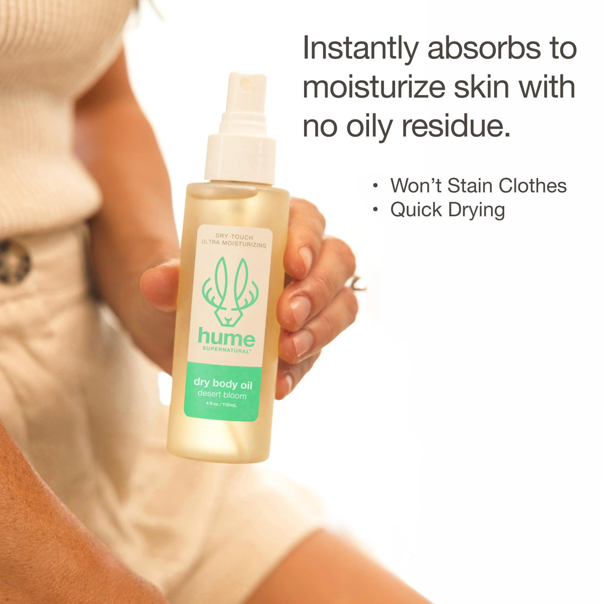 HUME SUPERNATURAL spray being dispensed to reveal even distribution