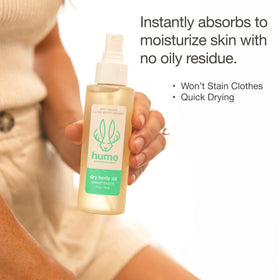 HUME SUPERNATURAL spray being dispensed to reveal even distribution