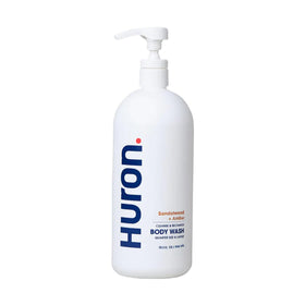 Huron body wash bottle front highlighting unisex formula for daily use.