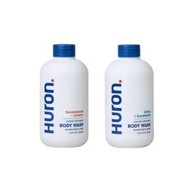 Huron Body Wash bottle pour with sea salt and driftwood, refreshing cleanse.