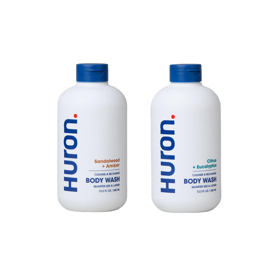 Huron Body Wash bottle pour with sea salt and driftwood, refreshing cleanse.