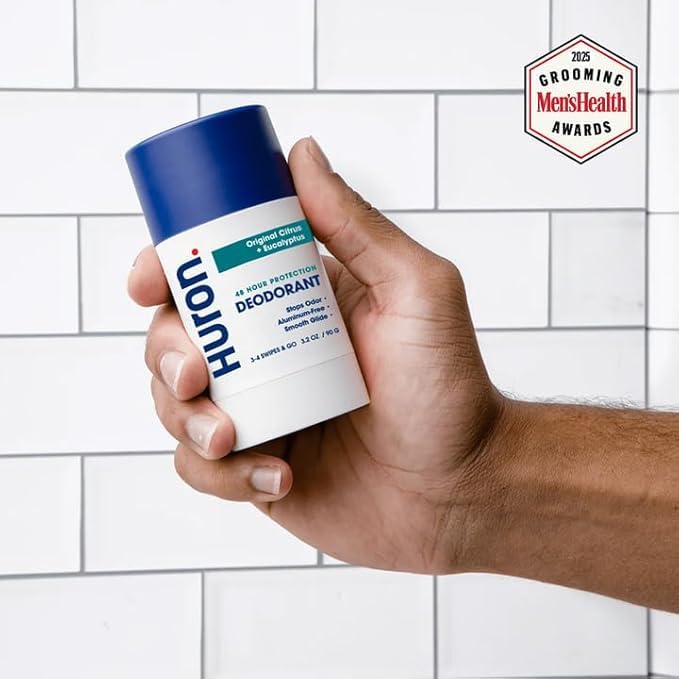 Huron deodorant application close-up showing easy, smooth swipe.