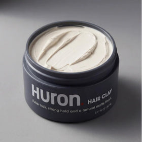 Huron Hair Clay displays a clean matte finish for everyday styling.
